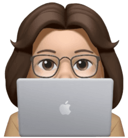 person peeking from behind laptop